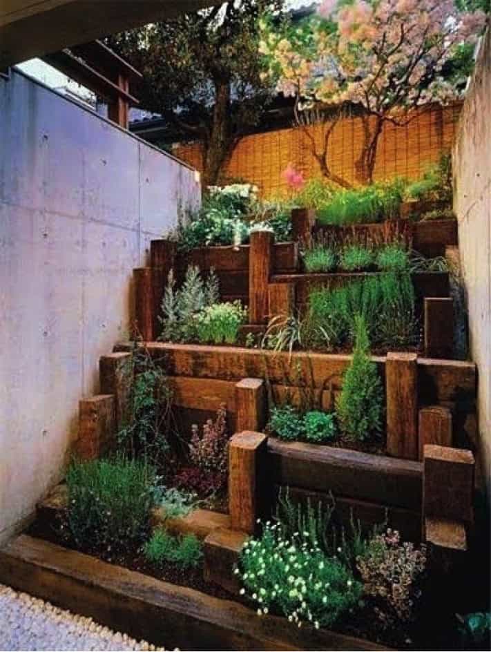 Vertical wooden herb garden Source