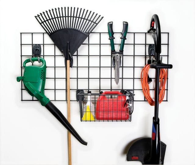 Organize your gardening tools on some wall grid 9