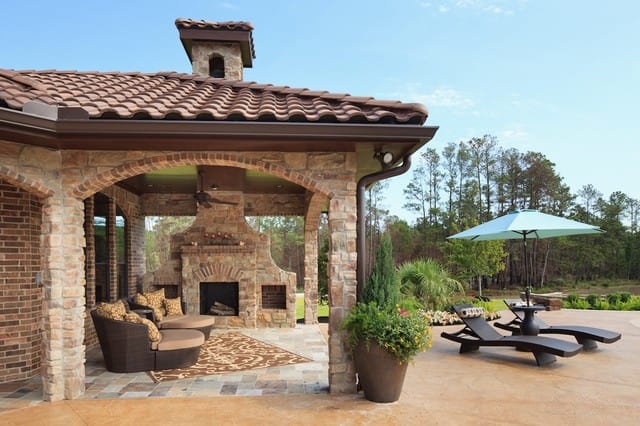 18 Astonishing Stone Fireplace Designs To Improve Your Outdoor Space 3