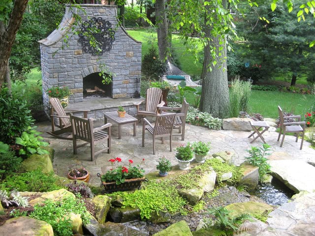 18 Astonishing Stone Fireplace Designs To Improve Your Outdoor Space 9
