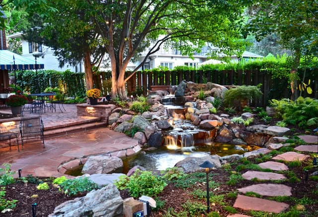 20 Awesome Waterfall Designs To Adorn Your Backyard 3