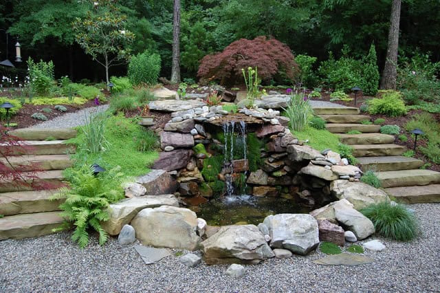 20 Awesome Waterfall Designs To Adorn Your Backyard 5