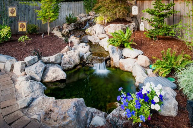 20 Awesome Waterfall Designs To Adorn Your Backyard 6