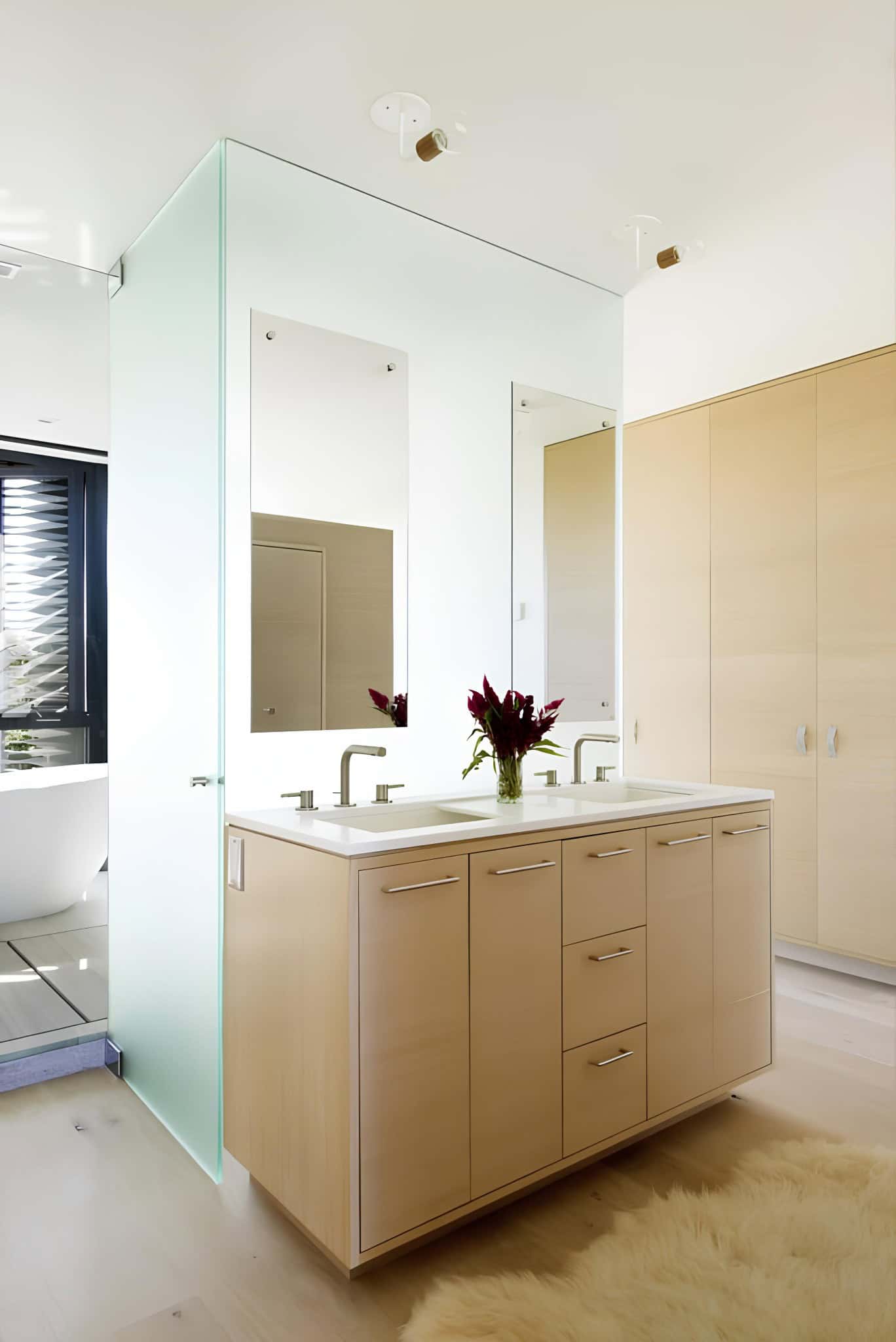 Double Vanity Mirror Flush Lighting Bathroom with double vanity and sleek flush lighting.