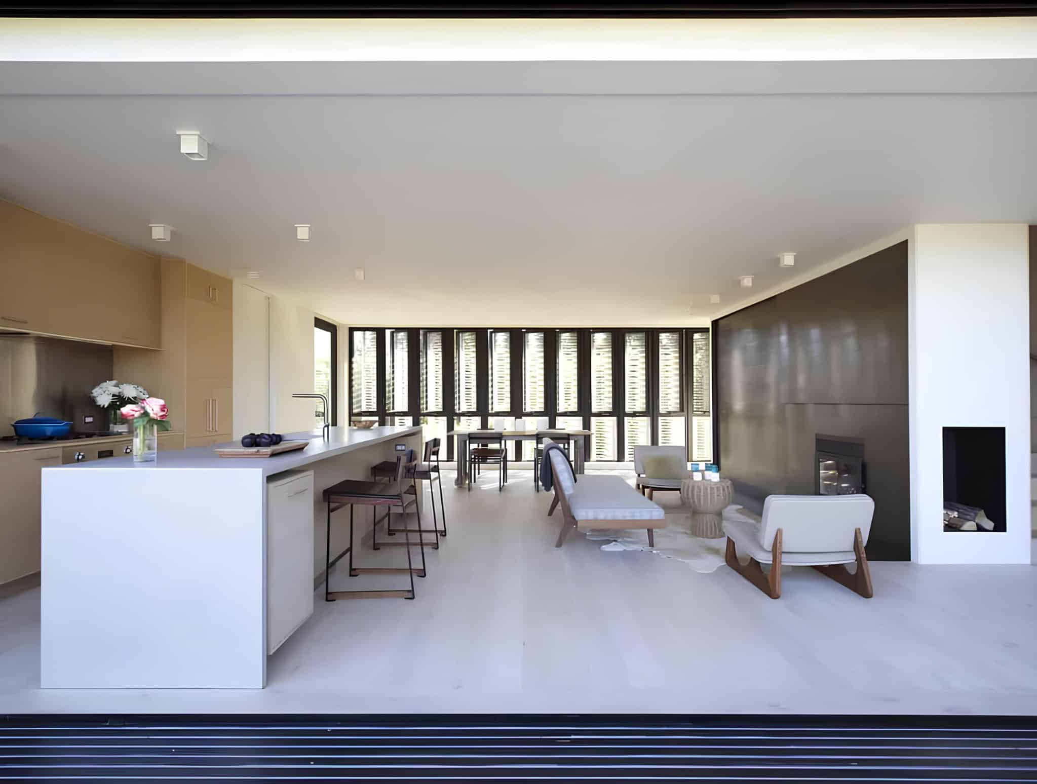 Open Kitchen Living Space Canvas Shades Open kitchen and living room with canvas-shaded windows.