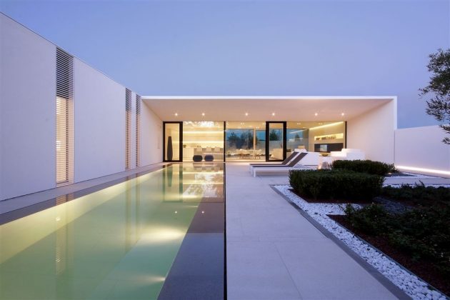 The Jesolo Lido Pool Villa by JM Architecture in Italy