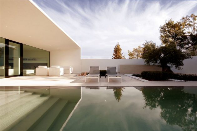 The Jesolo Lido Pool Villa by JM Architecture in Italy