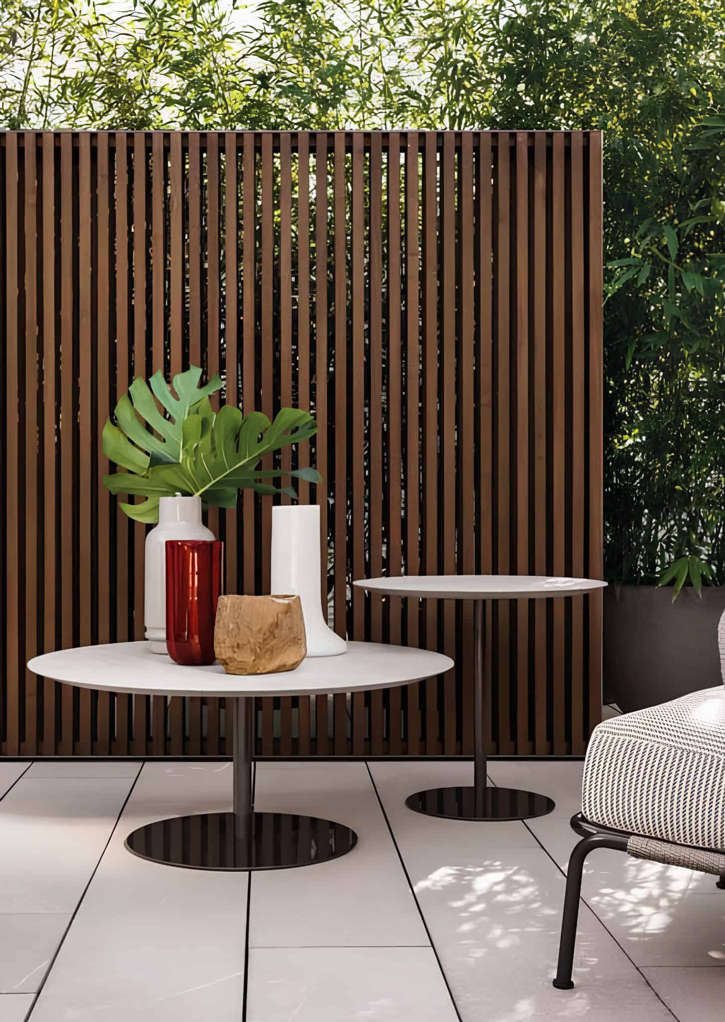 Vertical wooden slats creating a contemporary privacy screen in a garden