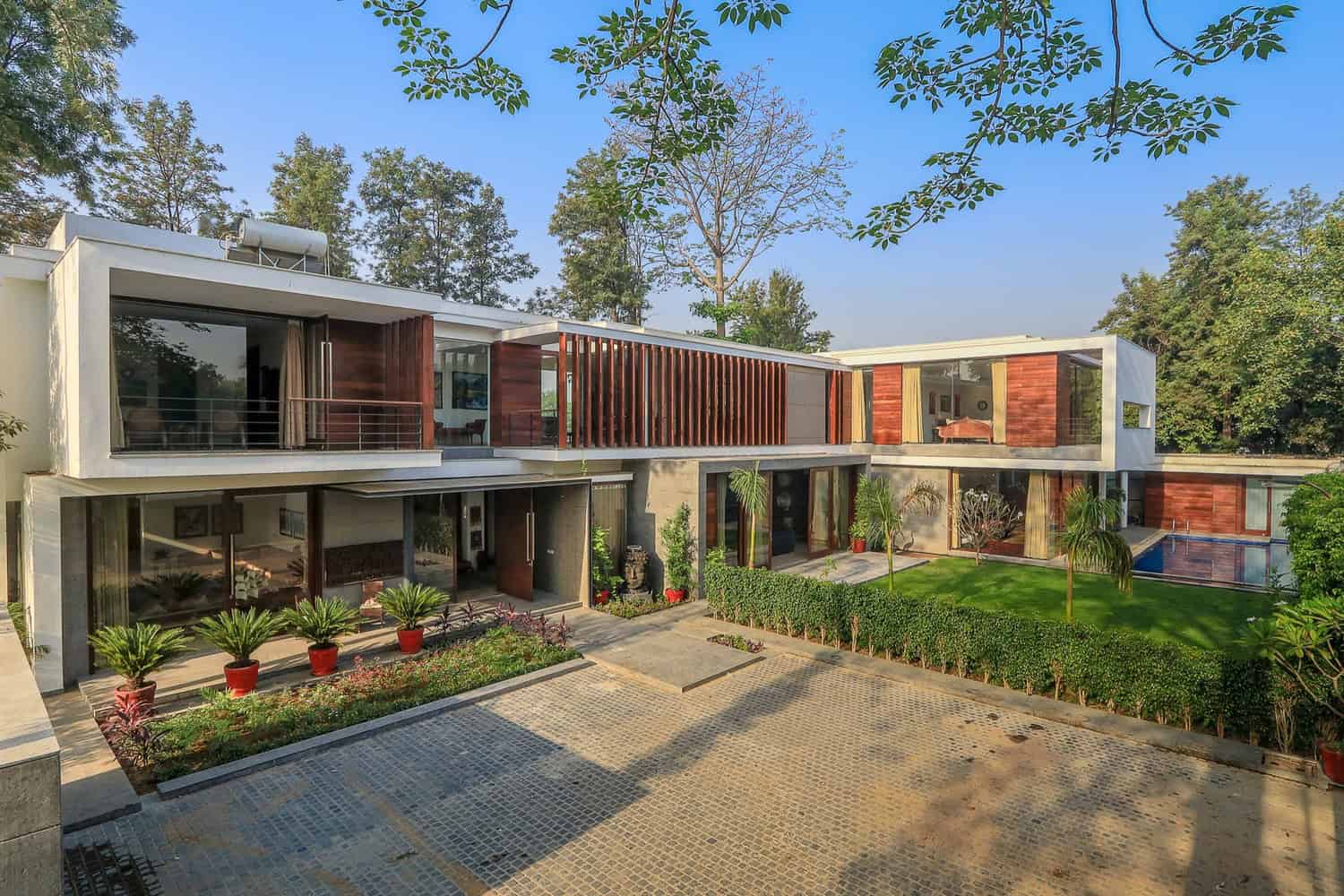 The modern house in india with a large garden