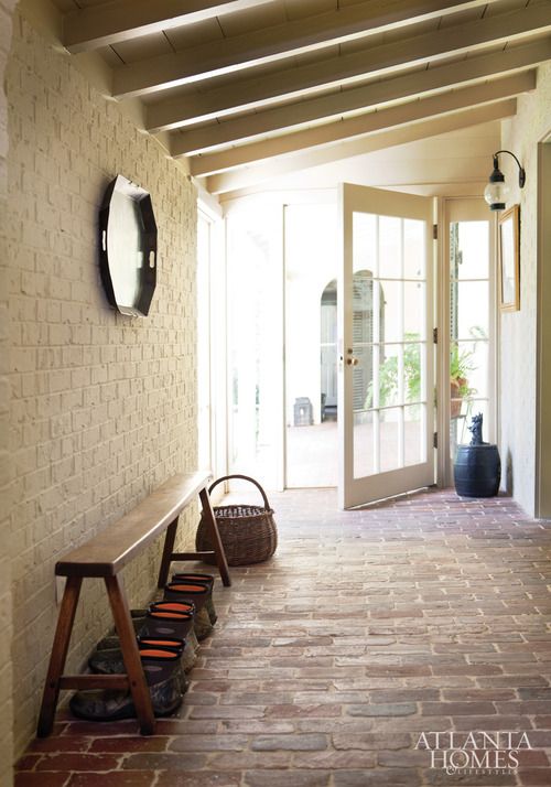 16 Fascinating Ideas To Style Your Entryway With Brick Walls
