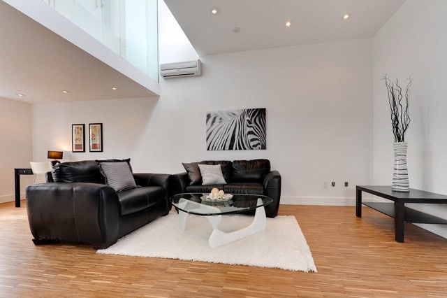 19 Styish Living Room Designs With Bold Black Furniture 14