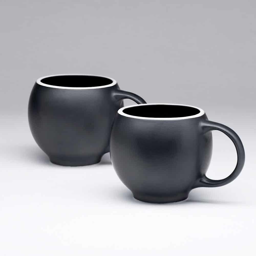 EVA teacups in black matte porcelain with white rims Buy it on: www.etsy.com