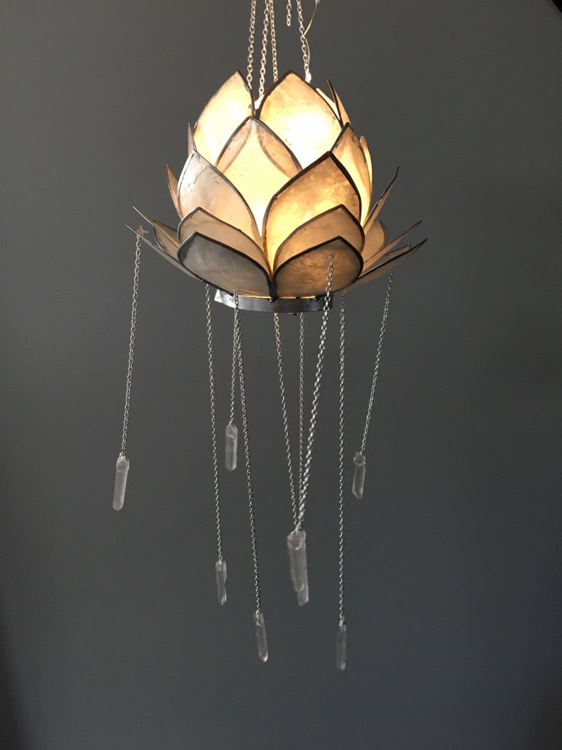 Lotus Chandelier Buy it on: www.etsy.com