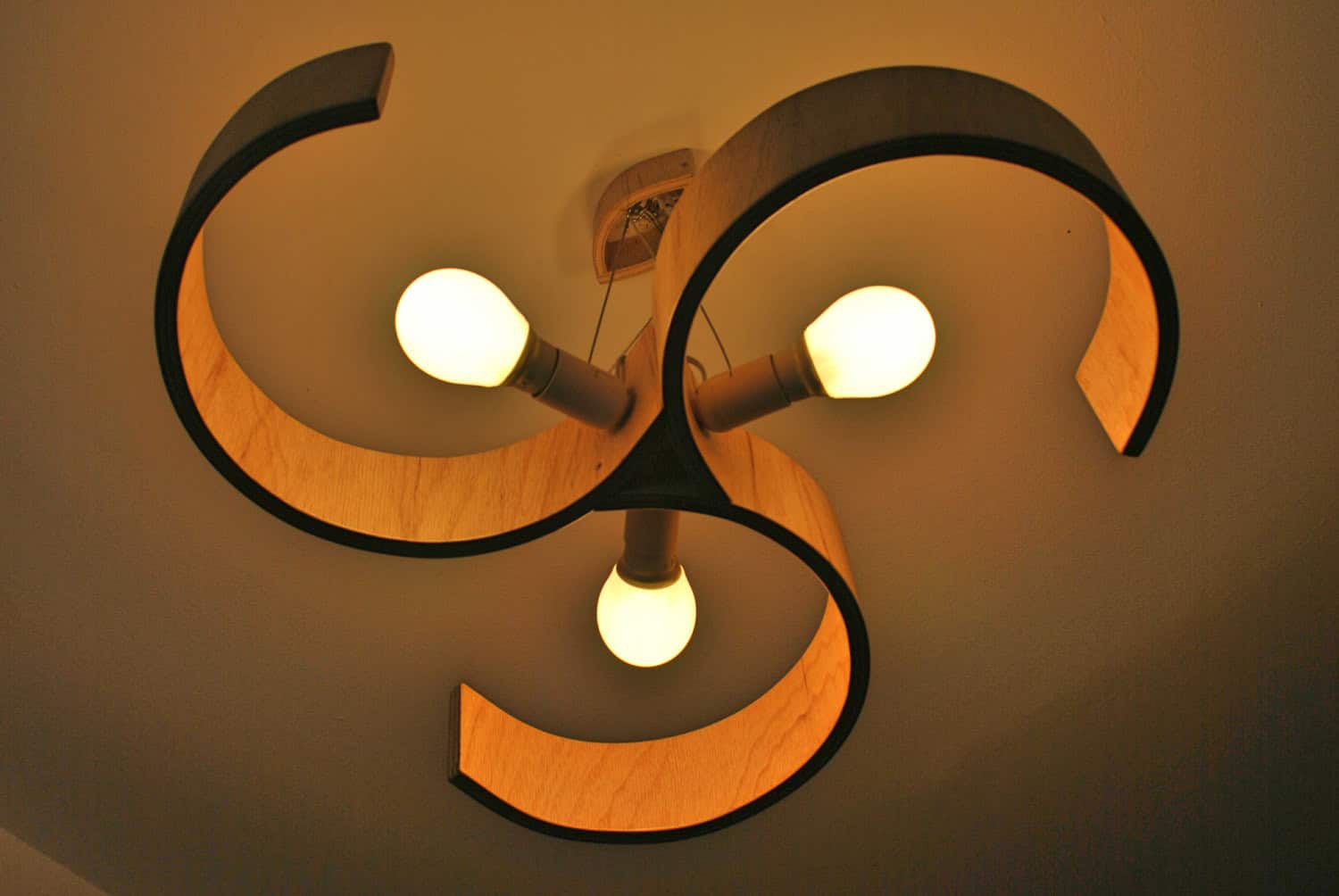 Swirl Chandelier made of bent plywood Buy it on: www.etsy.com