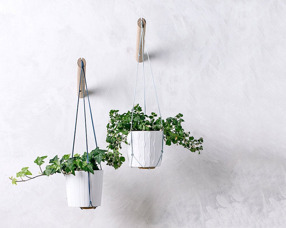 Hanging planter with light blue thread Buy it on: www.etsy.com