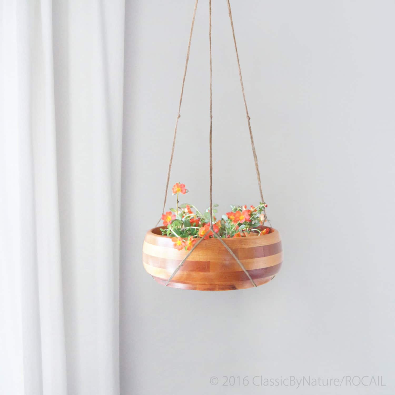 Natural beige jute macrame plant hanger Buy it on: www.etsy.com