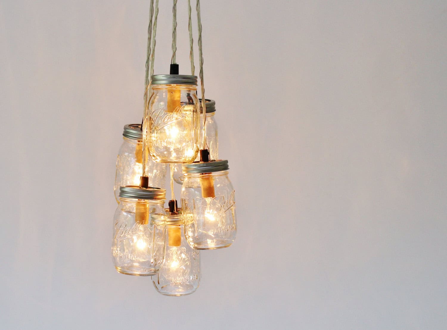 Mason Jar Cluster Chandelier Buy it on: www.etsy.com