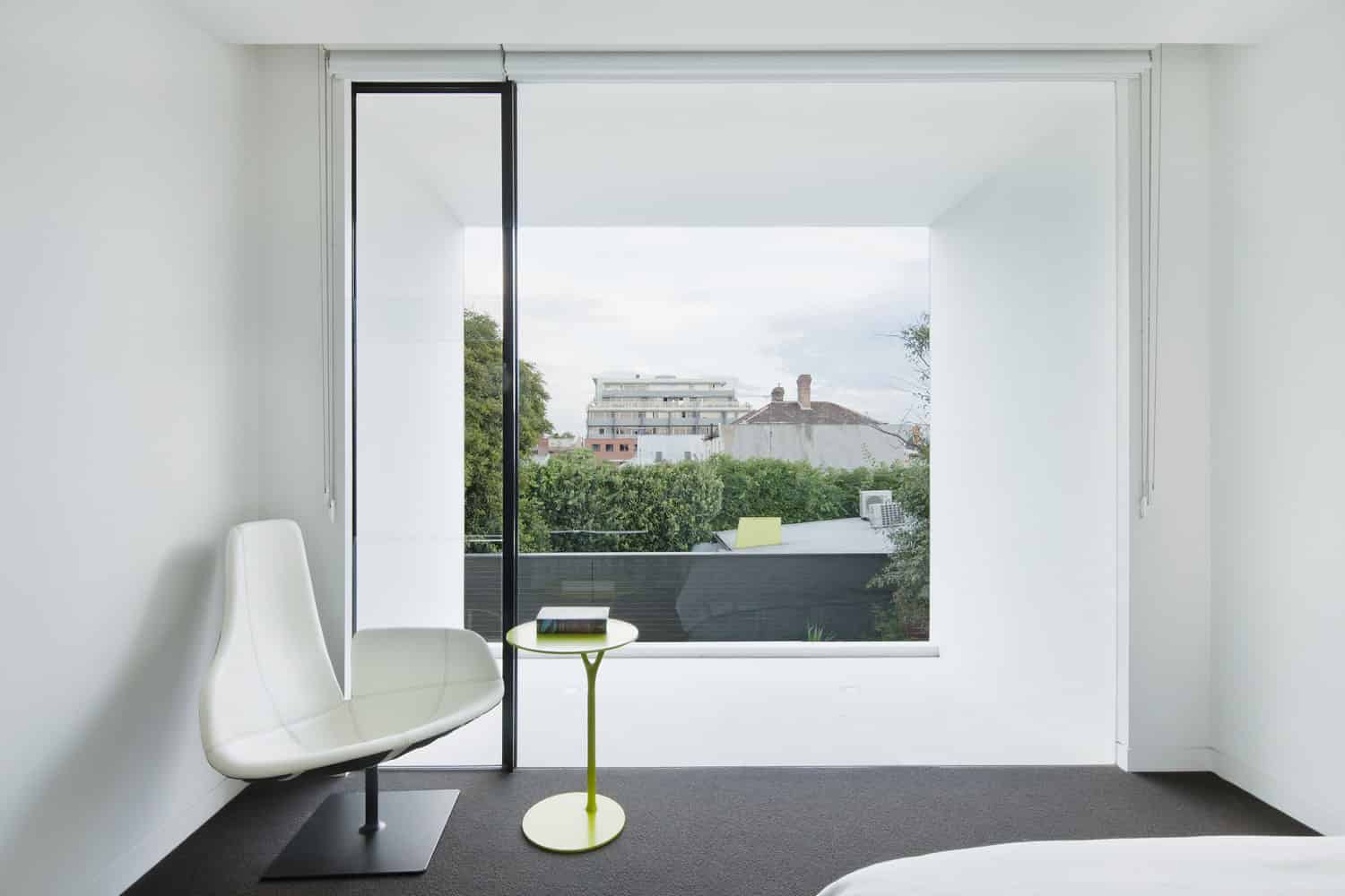 Shakin’ Stevens Residence by Matt Gibson Architecture + Design – A Victorian Cottage Reimagined in Melbourne Stunning modern architectural design of a contemporary house showcased on a computer monitor.