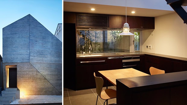 Contemporary modern house exterior with minimalist concrete façade and geometric design, showcasing sleek architecture and stylish outdoor lighting.