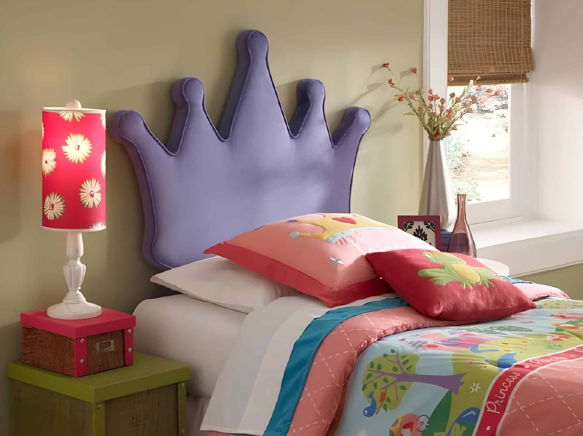 Royal purple crown headboard in a vibrant girls' princess bedroom