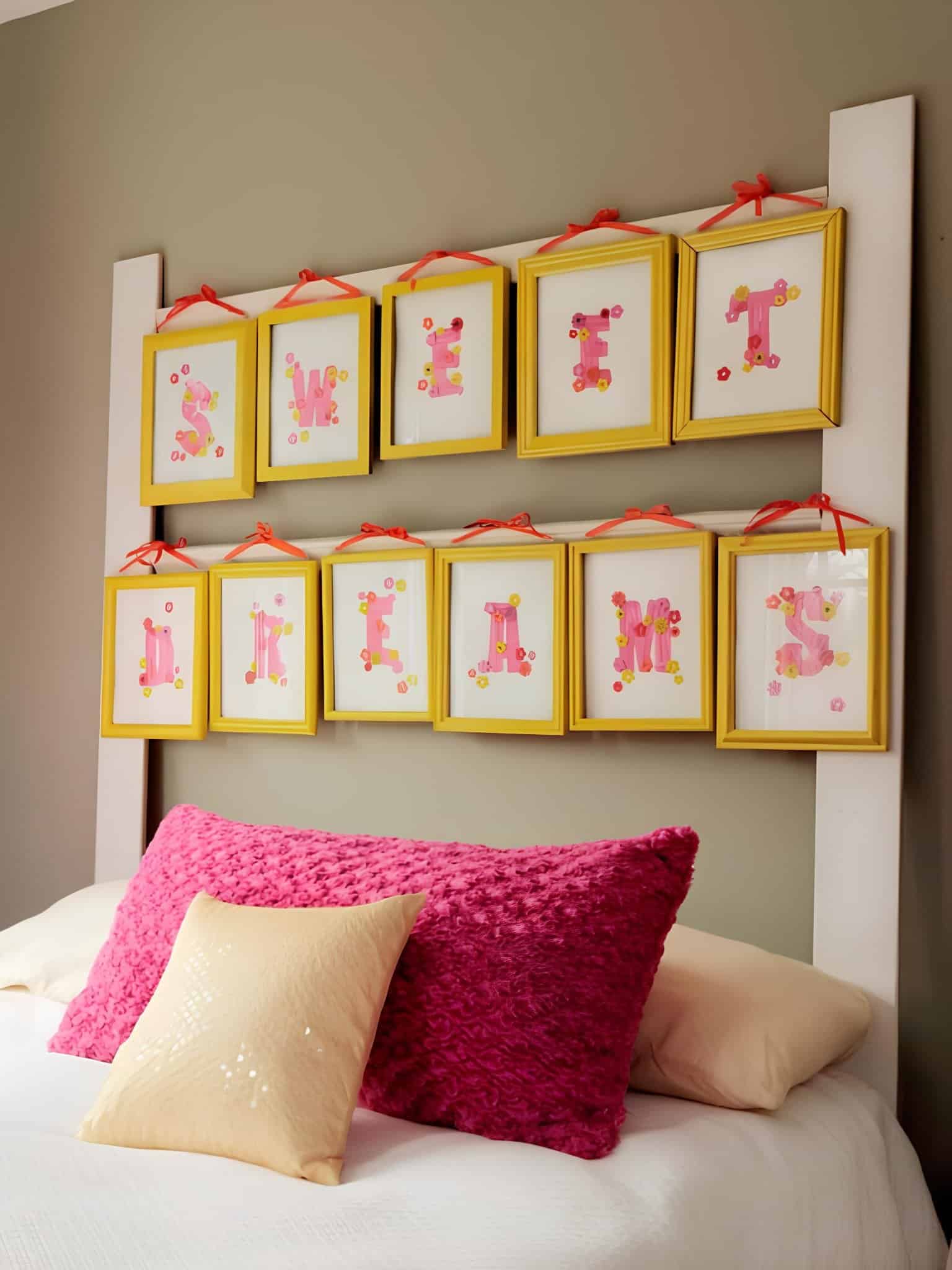 Creative headboard with yellow photo frames spelling Sweet Dreams