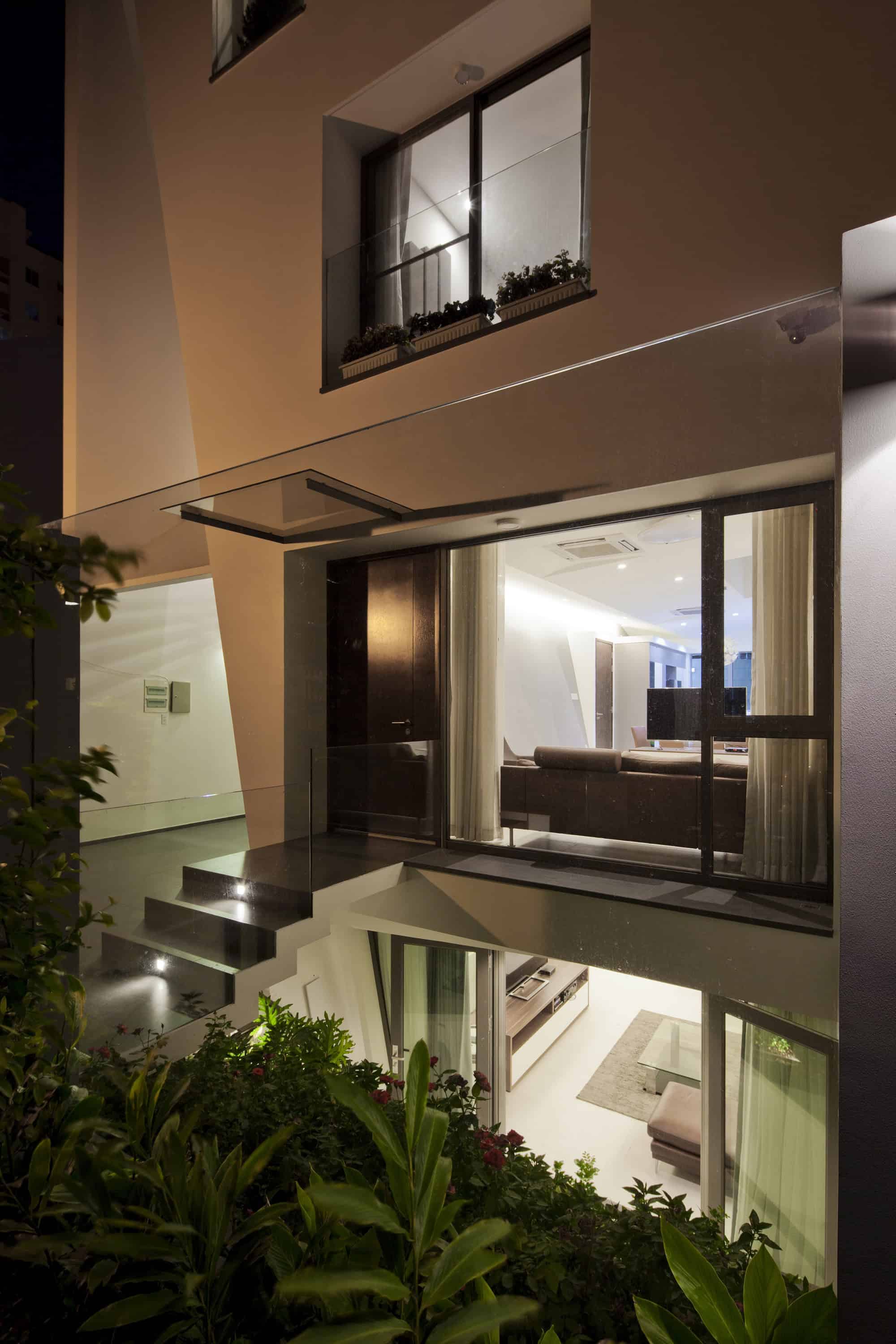 Folding Wall House by Nha Dan Architect in Ho Chi Minh, Vietnam Folding Wall House by Nha Dan Architect in Ho Chi Minh, Vietnam