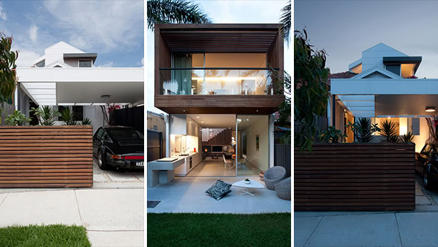 Modern minimalist house with sleek white exterior and spacious garage, featuring contemporary architectural design and clean lines.