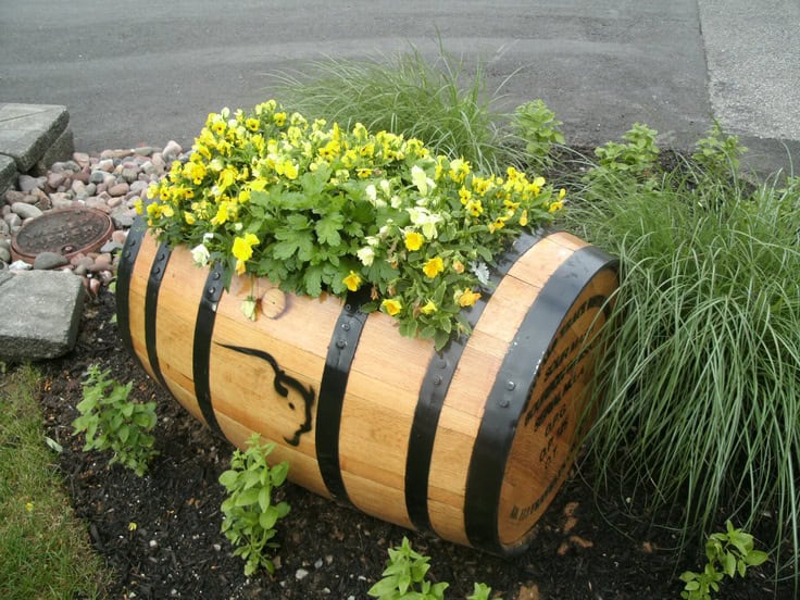 15 Impressive DIY Wine Barrel Planters That You Can Make In No Time