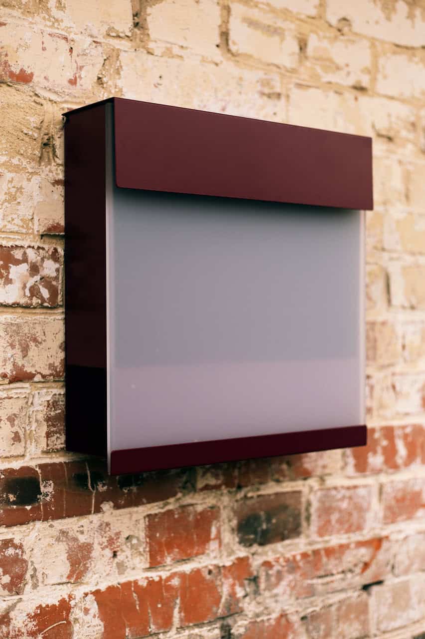 Red stylish mailbox made from stainless steel Red stylish mailbox made from stainless steel