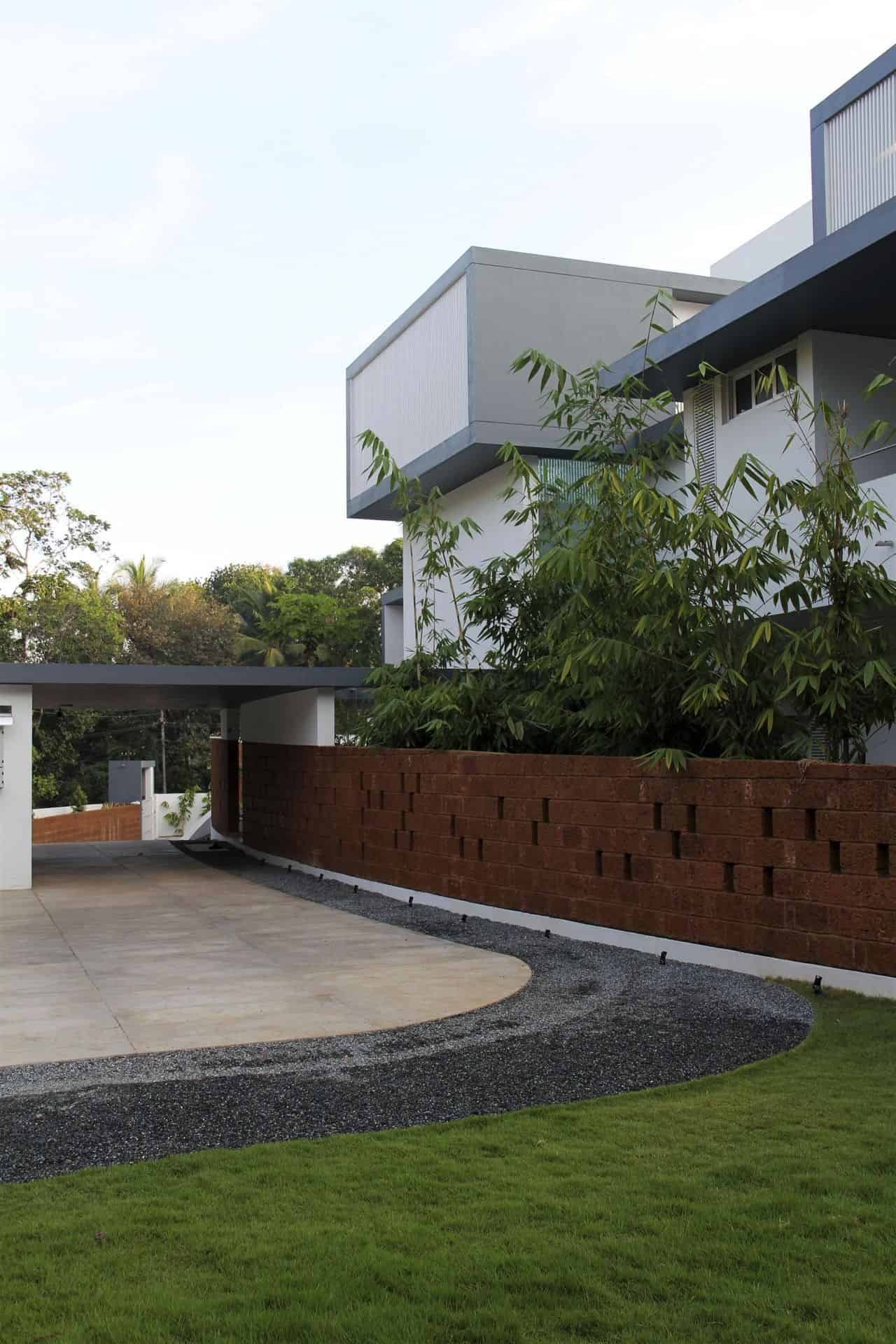 The Running Wall Residence by LIJO RENY Architects in Thalassery, India The Running Wall Residence by LIJO RENY Architects in Thalassery, India