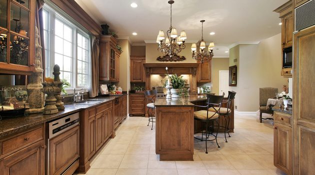 Large kitchen in wood cabinetry with island
