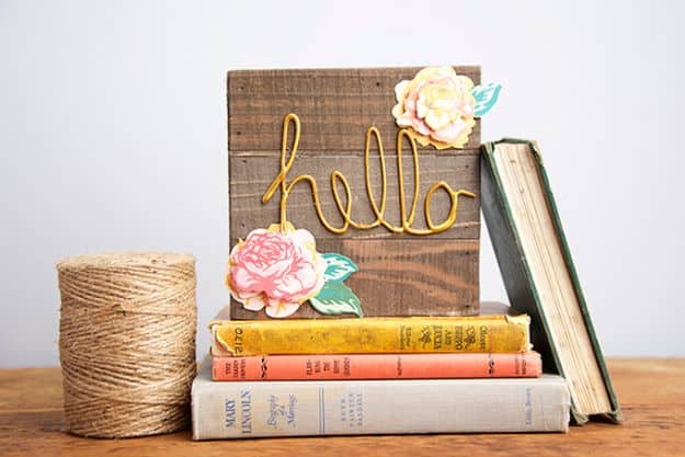 11. Floral Wood DIY Welcome Sign 11. Floral Wood DIY Welcome Sign