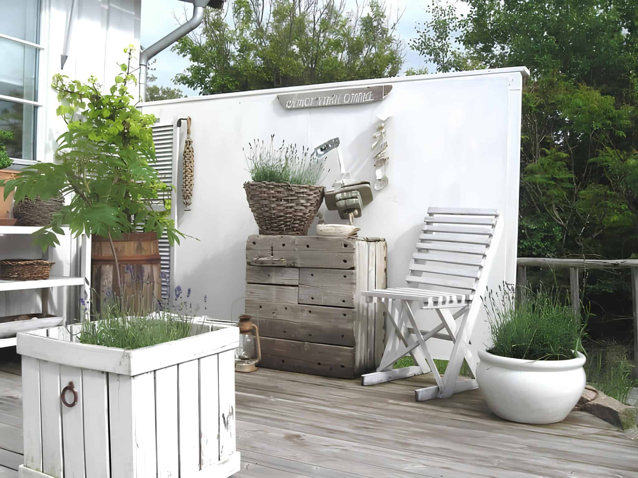 Rustic deck with white chair, stacked crates, and lavender planters