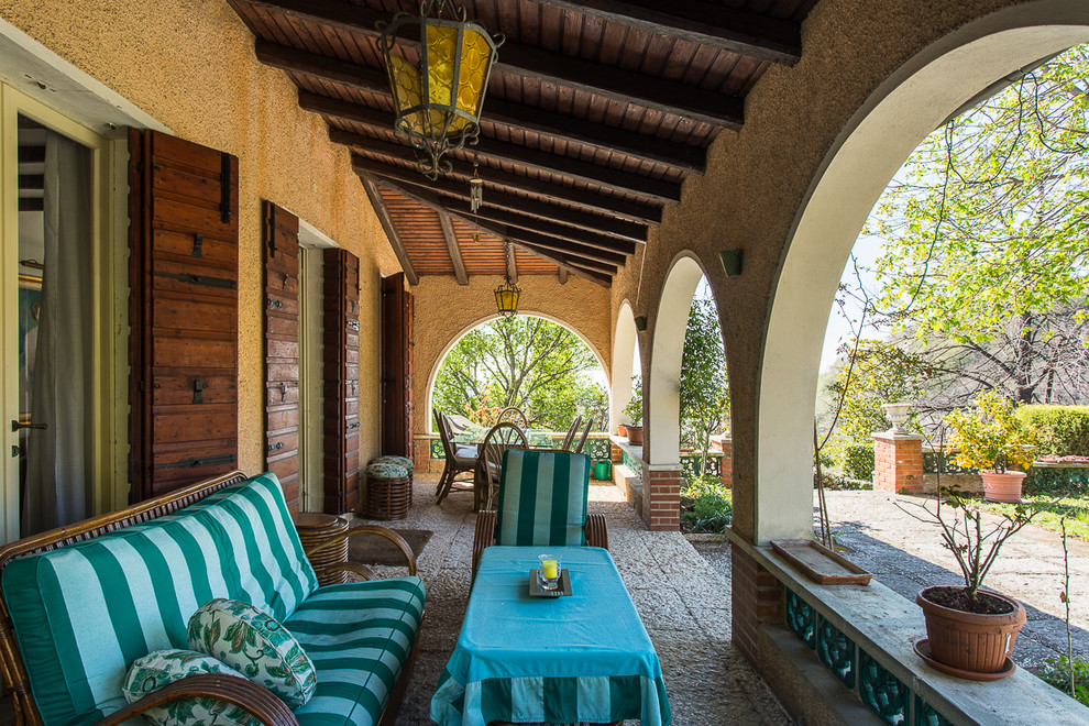 15 Beautiful Mediterranean Porch Designs That Will Drag You Outside