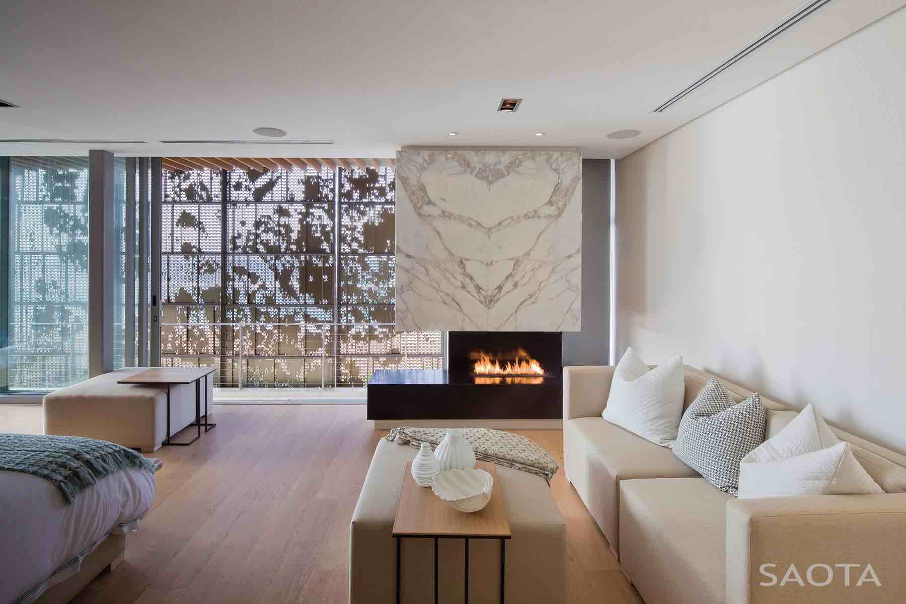 La Lucia — Timber and stone palette Weathered timber and honed sandstone detailing around the outdoor living areas at La Lucia.