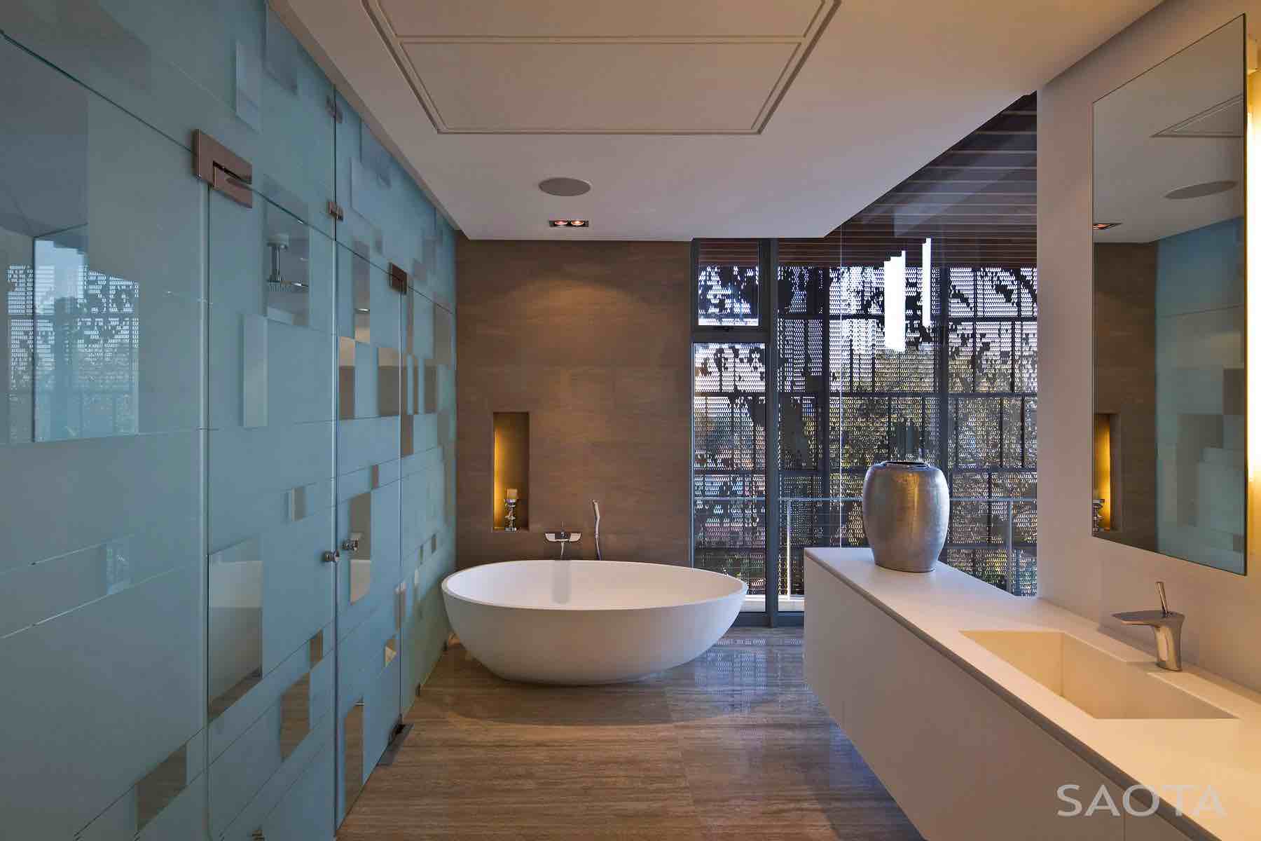 La Lucia — Coastline intimacy Sheltered outdoor room framed by timber slats and planting, opening toward the coast.