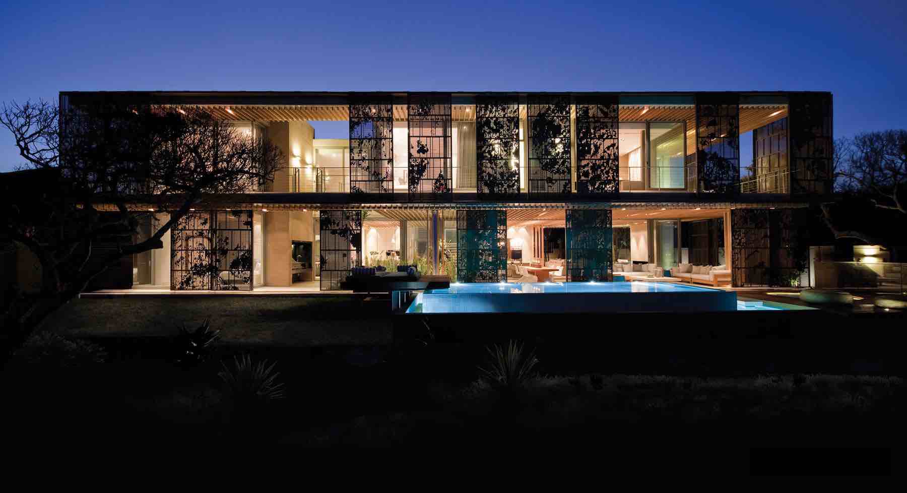 La Lucia — Long coastal outlooks Long views from living areas across the pool terrace toward the ocean horizon in La Lucia.