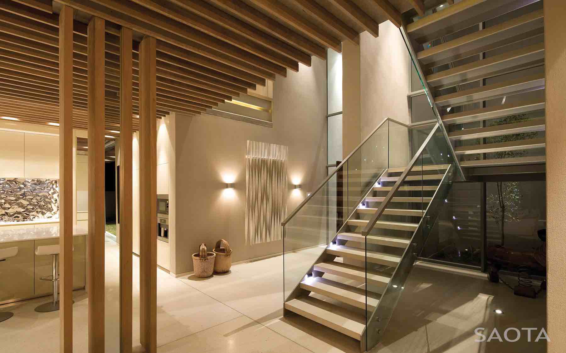 La Lucia — Dining and lounge connection Dining zone seamlessly connected to sheltered outdoor lounge at La Lucia residence.