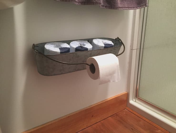 16 Really Cool Ways To Store Toilet Paper In The Bathroom
