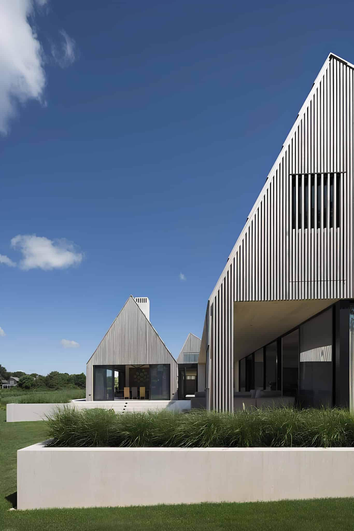 Entry Corridor Modern House Bates Masi Glass entry corridor connecting volumes of a modern residence.