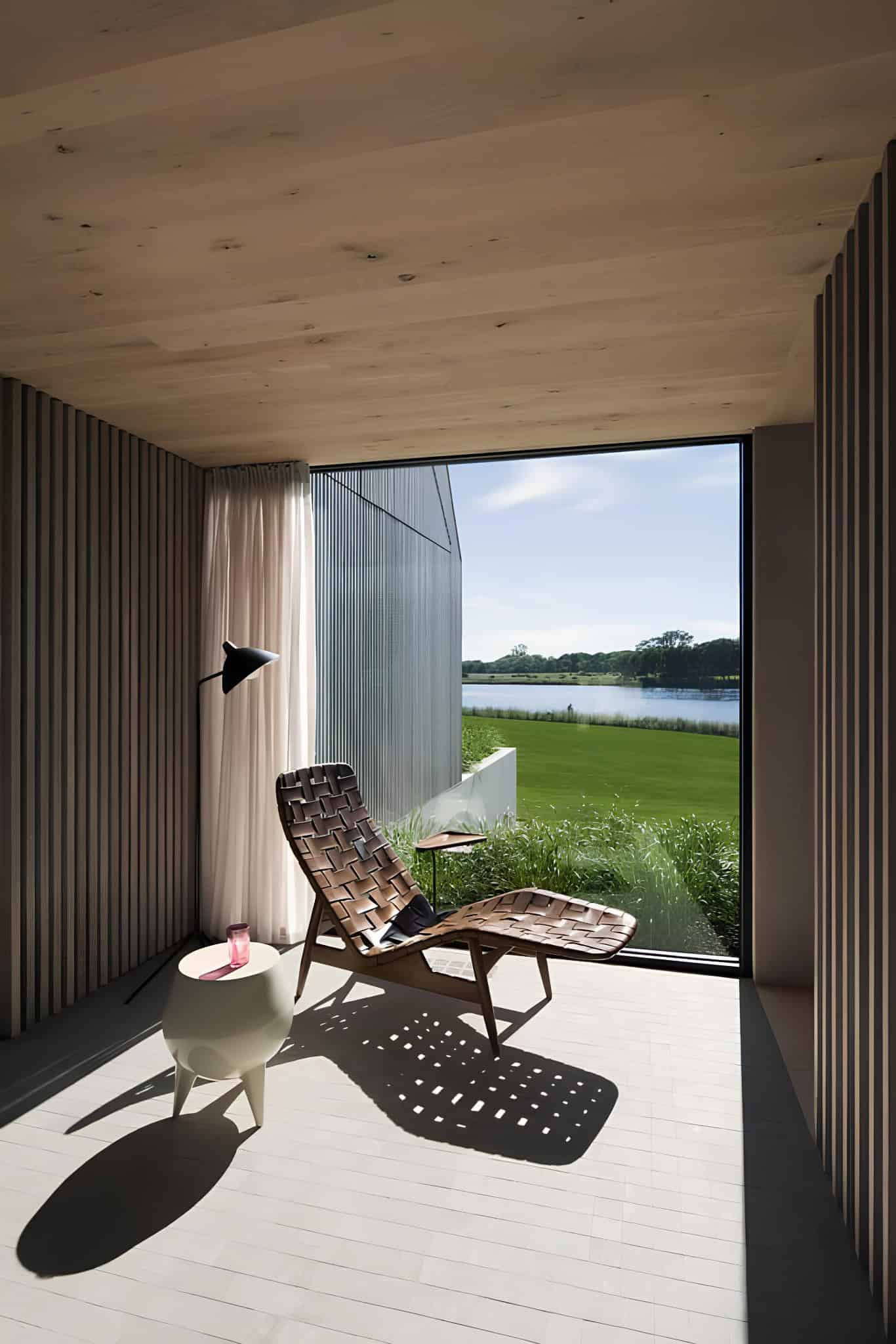 Relaxation Nook with Water View Cozy nook with lounge chair and floor-to-ceiling view of the water.