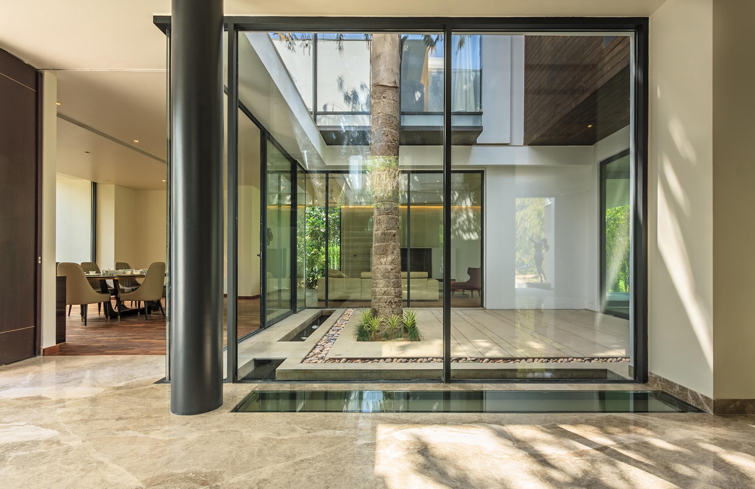 Caryota House by Dada & Partners: A Minimalist Retreat Rooted Around a Palm Courtyard Caryota House by Dada & Partners: A Minimalist Retreat Rooted Around a Palm Courtyard