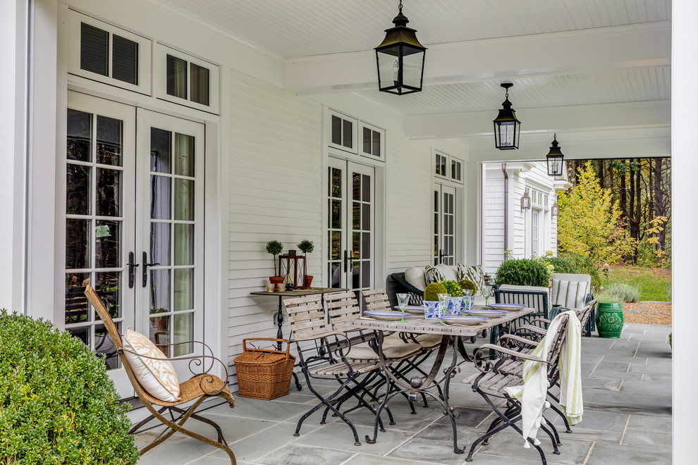 15 Irresistible Farmhouse Porch Designs You're Going To Drool Over