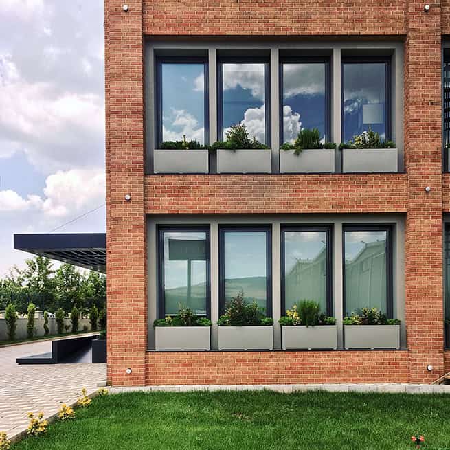 Inspired by The Red Soil Found in The Region: EMPERA HEADQUARTERS Inspired by The Red Soil Found in The Region: EMPERA HEADQUARTERS