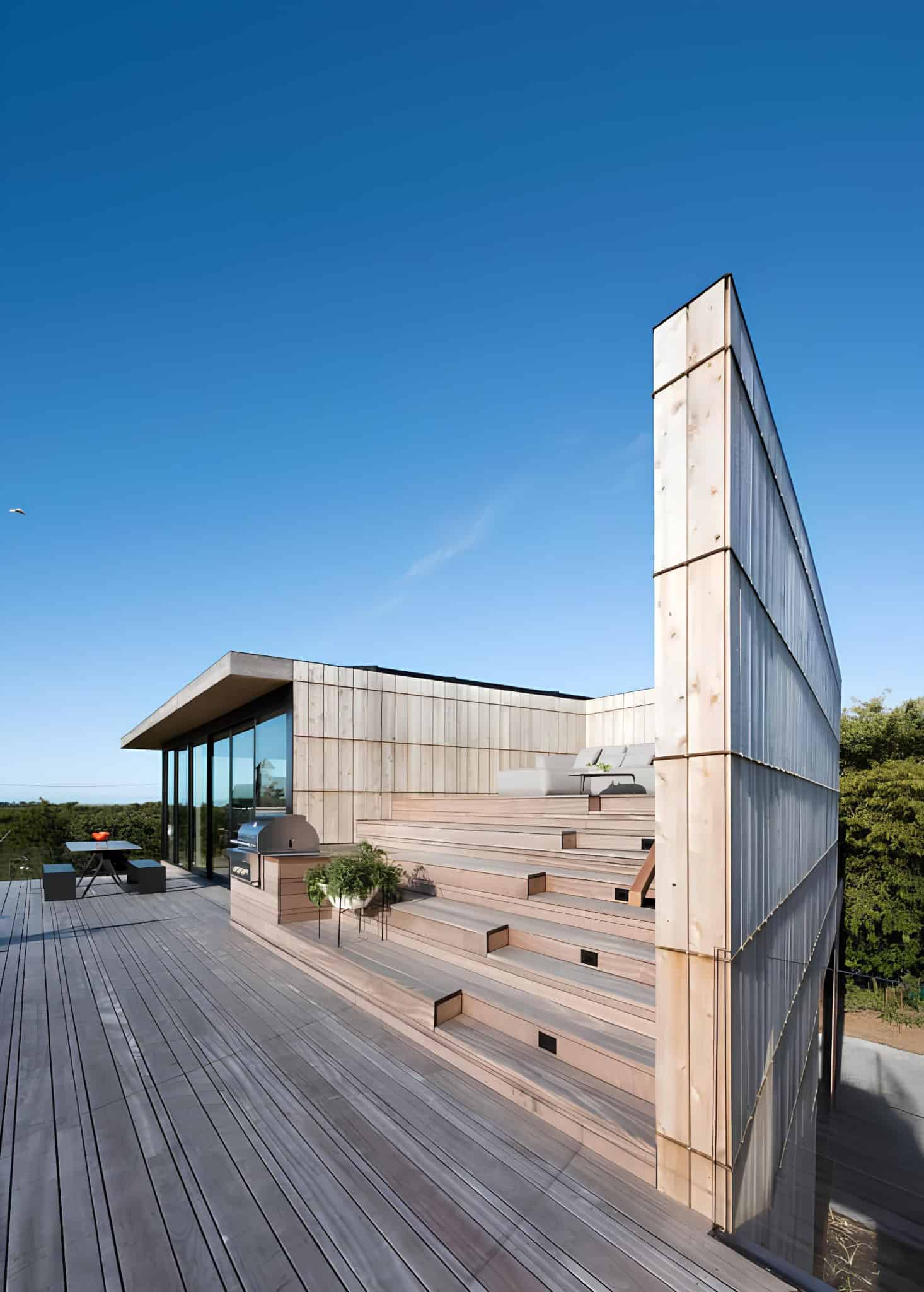 Atlantic House Deck Integrated Step Terraces Tiered deck steps and grilling area on the upper terrace of Atlantic House.