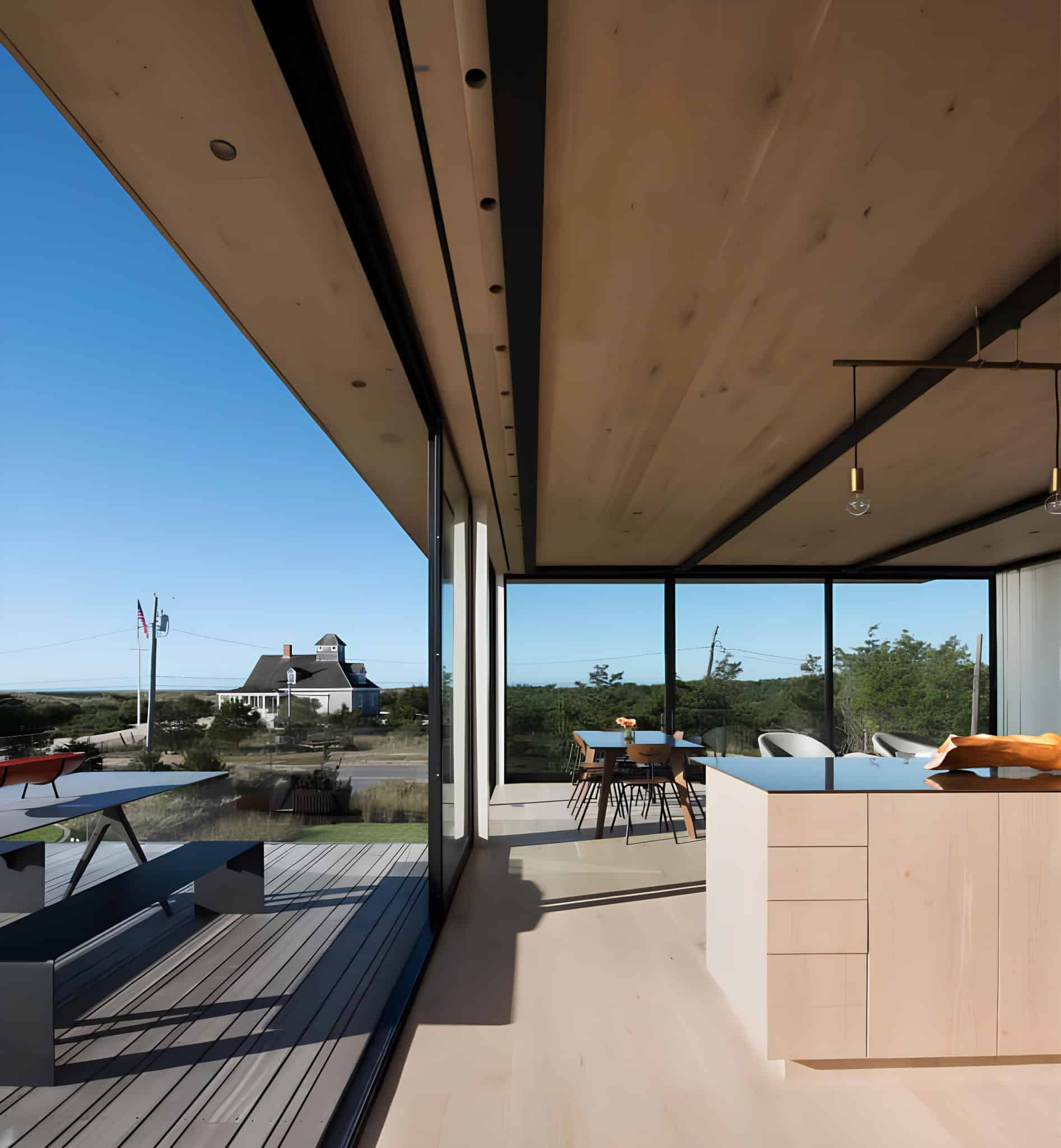 Atlantic House Dining View From Deck Dining area seen from the deck of Atlantic House with expansive ocean views.