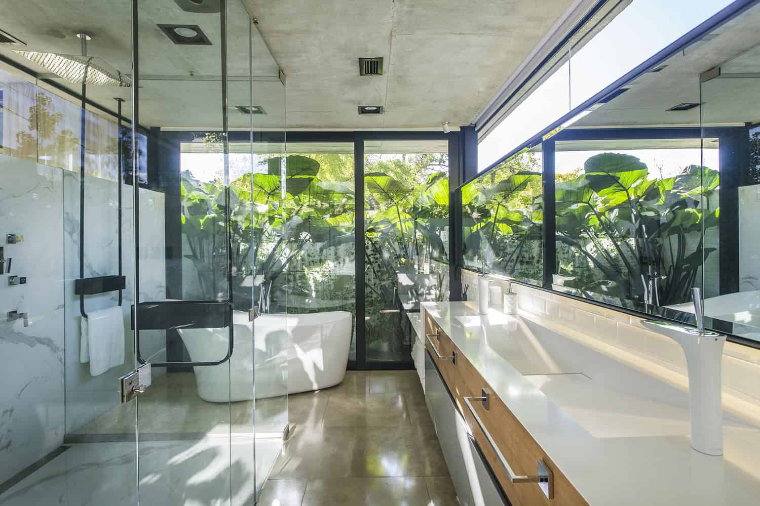 BT House street façade with protective shell BT House street façade in exposed concrete with controlled openings