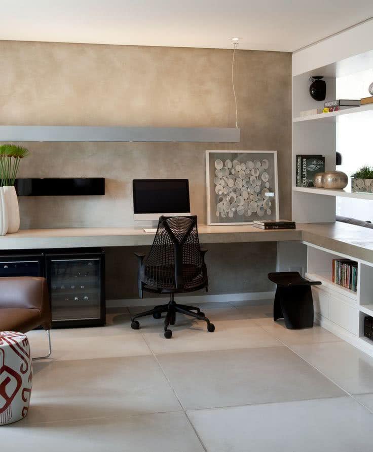 Minimalist Home Office with Concrete Worktop and Exposed Concrete Wall, Highlighting a Rectangular Lamp Minimalist Home Office with Concrete Worktop and Exposed Concrete Wall, Highlighting a Rectangular Lamp