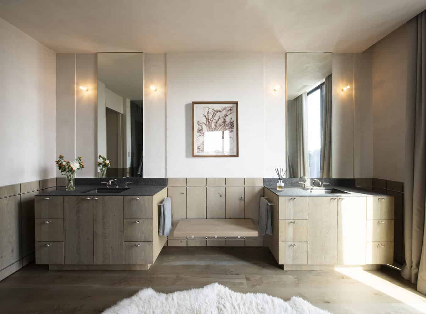 Kiht’han House Double Vanity Bathroom Bathroom interior of Kiht’han House with dual vanities and soft lighting.