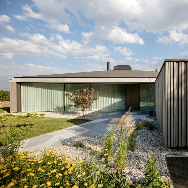 House in Hauterive, Switzerland by Bauzeit Architekten